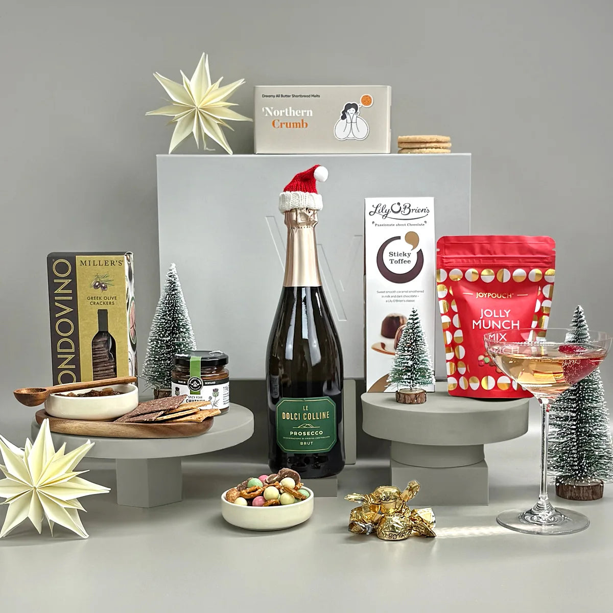 Noel is a joyful Christmas gift hamper, perfect for corporate Christmas gifts. Includes Prosecco, treats, a charitable meal donation and free UK delivery.