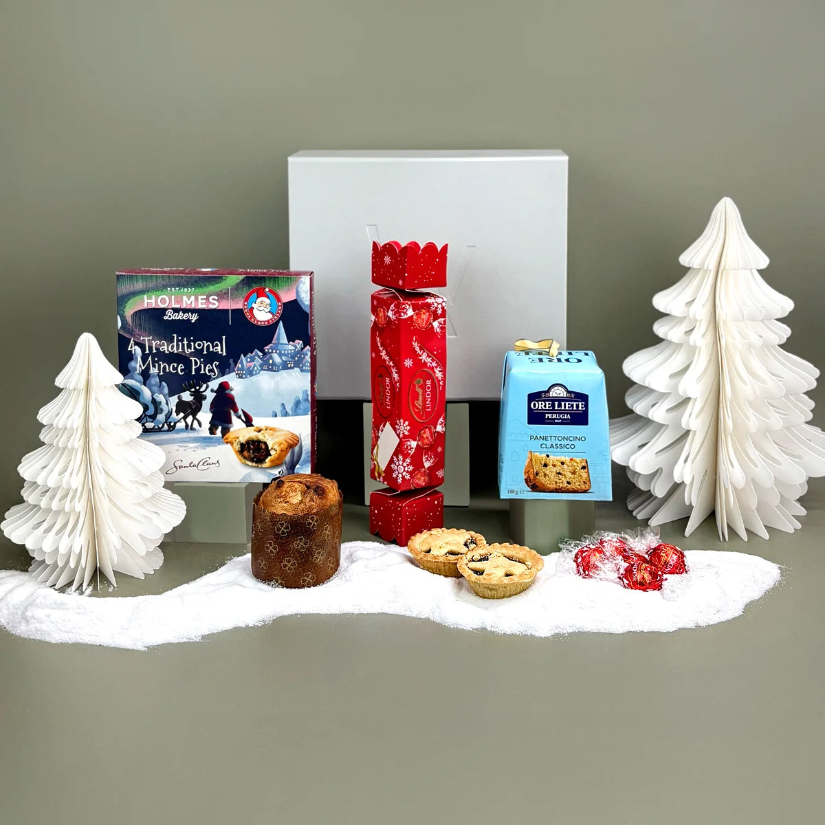 The Yuletide gift is the perfect employee Christmas gift or small staff gift, filled with mince pies, panettone & Lindt chocolates, plus a charitable donation.