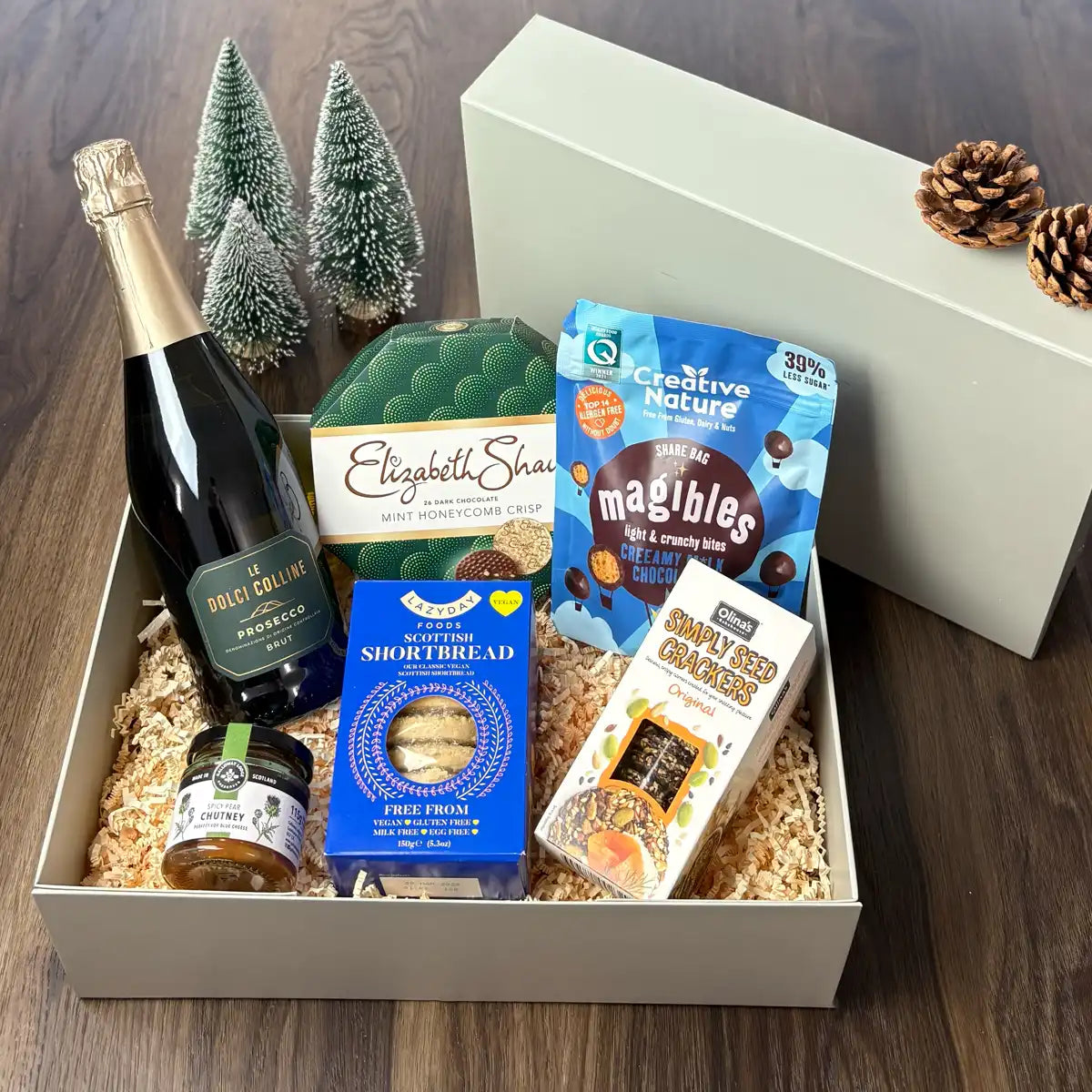 Vegan and Gluten Free Festive Food Hamper with Prosecco in a sustainable gift box.