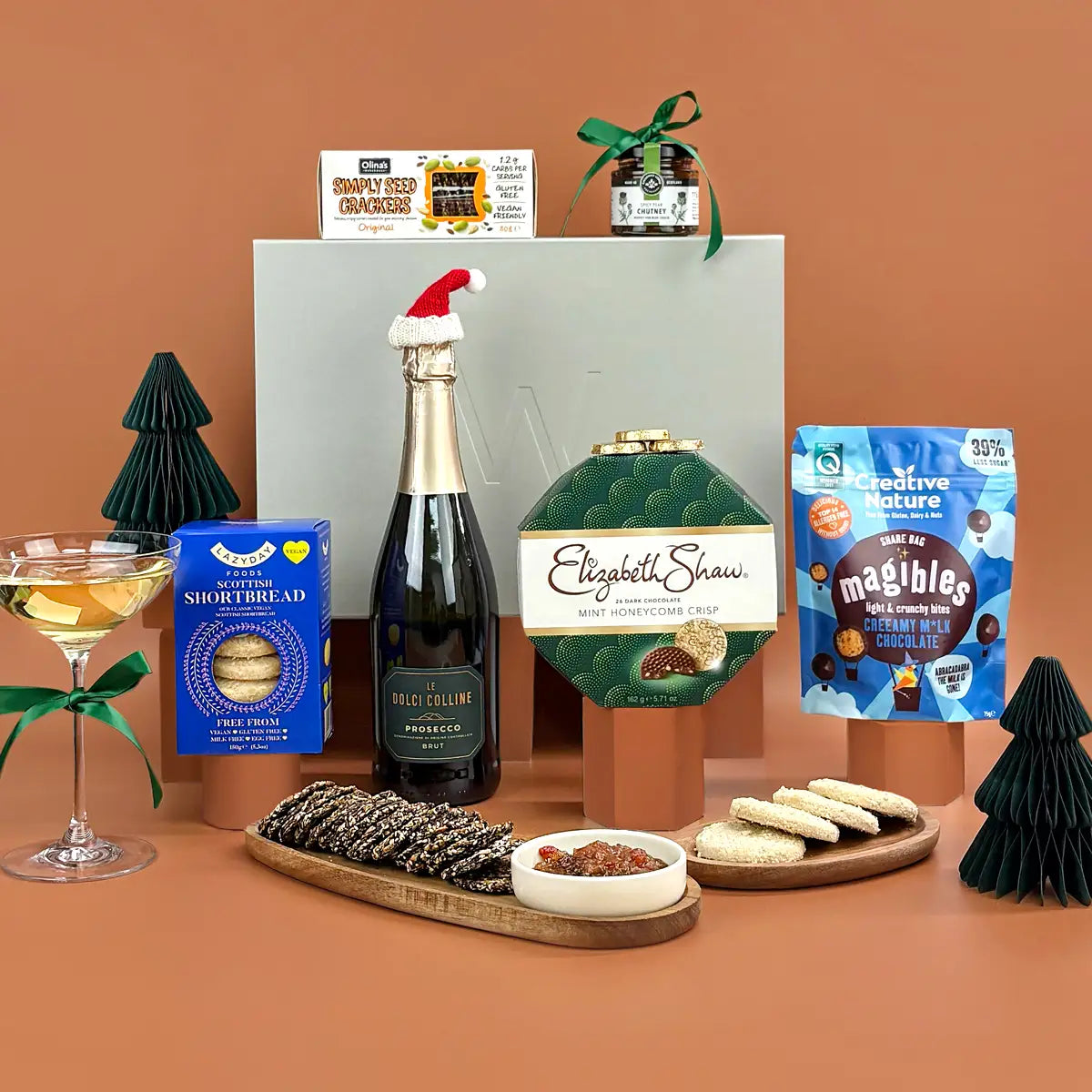 Vegan and Gluten-Free Christmas hamper with sweet treats, festive snacks with fizz or no alcohol option. 