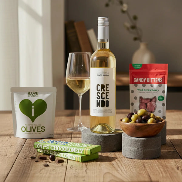 White wine gift with sweet and savoury snacks, plus a charitable meal donation. 